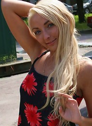 Blondie does a pussy flashing show on parking lot